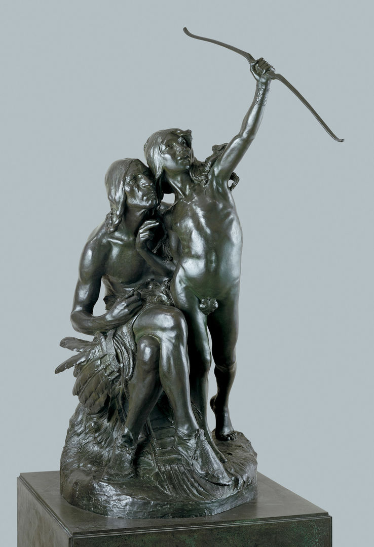 A bronze sculpture of two figures, one with a bow raised in the air