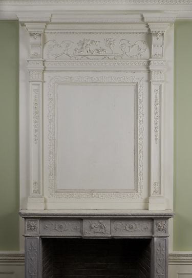 The carved marble mantel, added to the fireplace currently installed in the Benkard Room in 1810