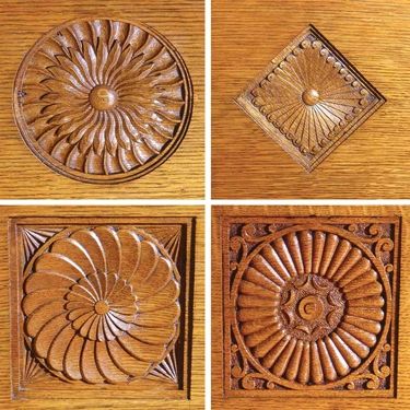Photographs of ornamental wood carvings in the panels of the Metcalfe stair hall