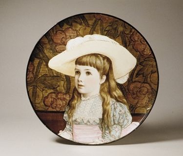 Portrait of a young girl on an earthenware, polychrome enamel plaque