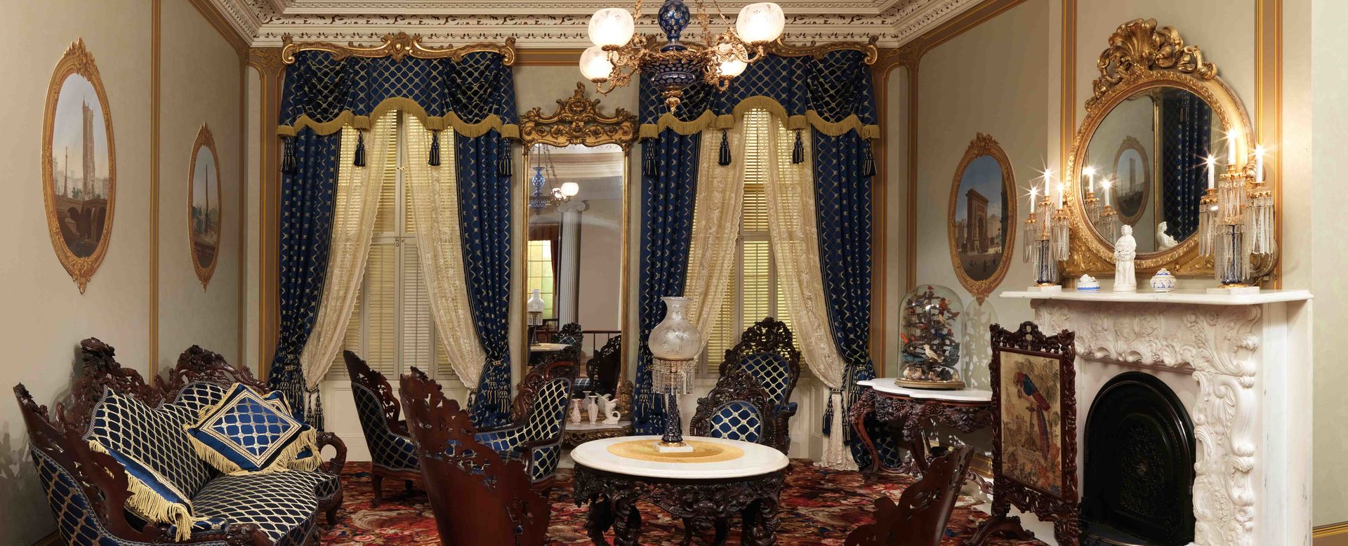 A cropped view of the Rococo Revival Parlor as installed in the American Wing at the Metropolitan Museum of Art.