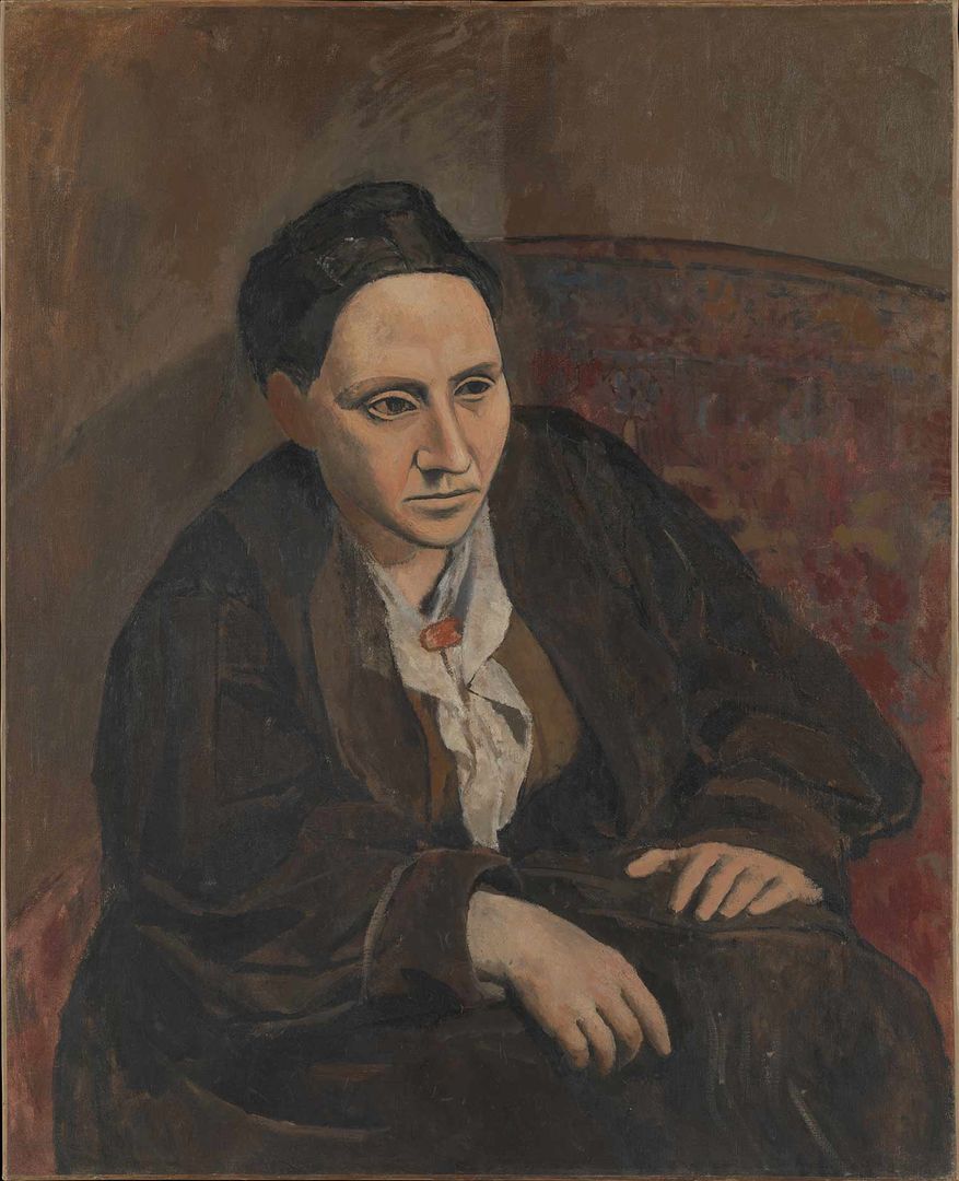 Portrait painting of a woman, Gertrude Stein, wearing brown seated in a brown chair. 