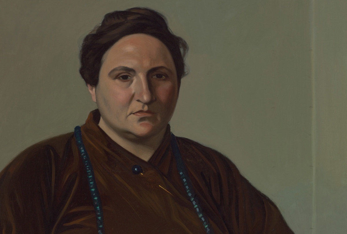 Detail of a portrait of Gertrude Stein wearing a brown dress in front of a green wall painted by Felix Vallotton. 