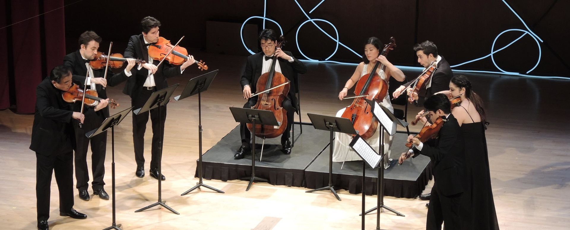 A string sextest performs on the Grace Rainey Rogers Auditorium stage