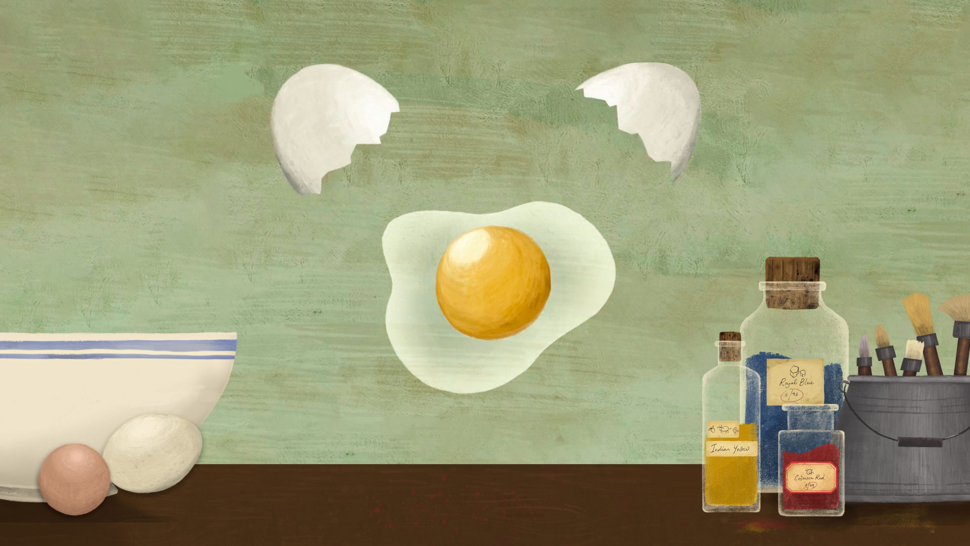 A cracked egg floats over a table top surface featuring a bowl and whole eggs as well as a bucket of paint brushes and bottles of blue, yellow, and red pigments.