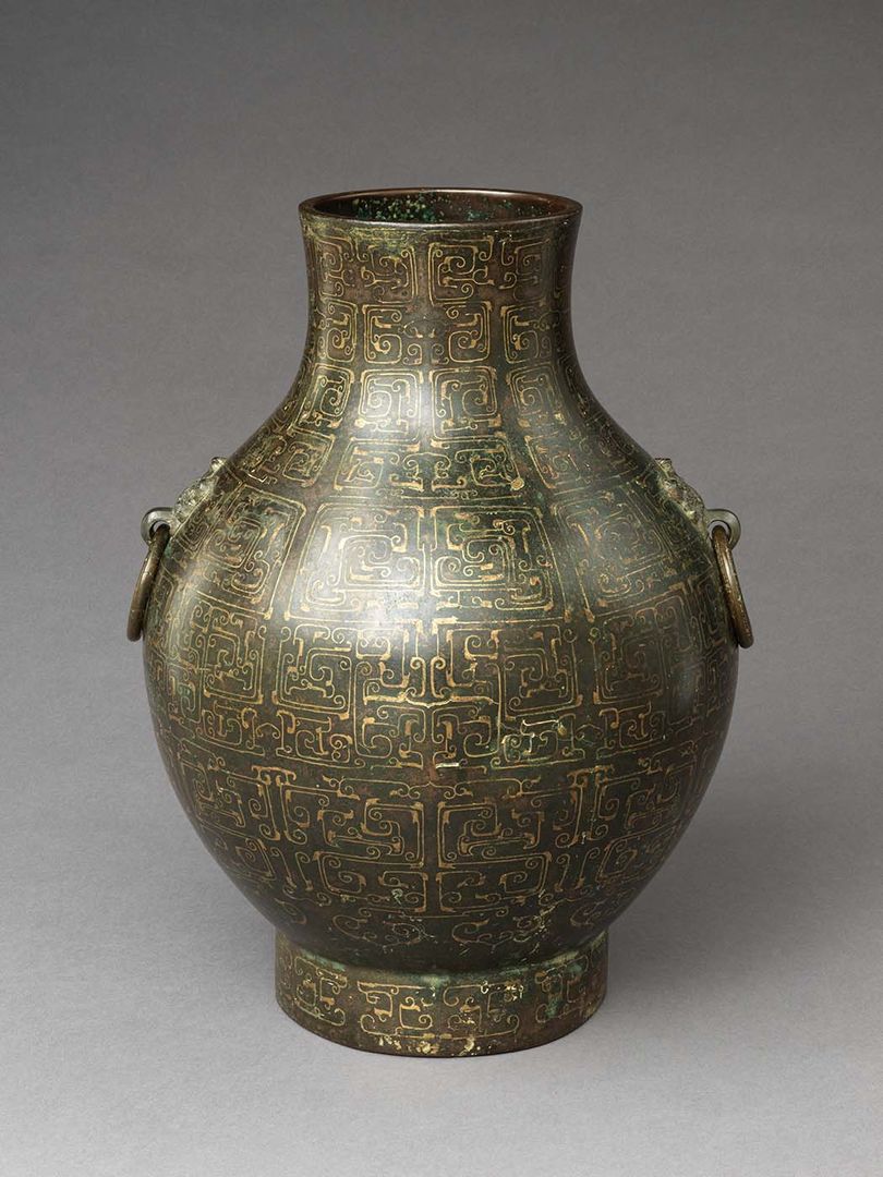 Photograph of Wine container (Hu), China, Eastern Zhou dynasty (770–256 B.C.), early 4th century B.C. Bronze inlaid with copper alloy. H. 13 in. (33 cm). Purchase, The Vincent Astor Foundation Gift, 2021 (2021.259)