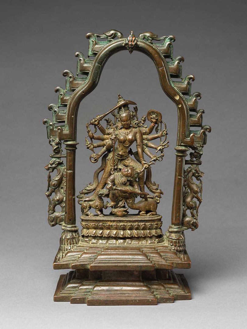 Photograph of sculpture of the Goddess Durga slaying the demon Mahisha. Bangladesh, northern Bengal, possibly Varendra region, Pala-Sena dynasty, ca. 12th century. Copper alloy. H. 12 7/8 in. (32.7 cm); W. 8 1/4 in. (21 cm); D. 4 3/4 in. (12.1 cm) Purchase, David Nalin Gift, The Miriam and Ira D. Wallach Foundation and Richard Greenbaum Funds, and Florence and Herbert Irving Acquisitions Fund for Asian Art, 2020 (2020.399)