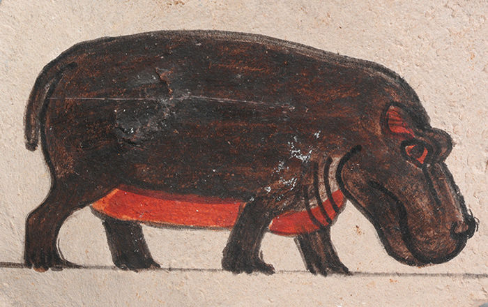Ancient Egyptian artist's drawing of a brown hippo on a fragment of limestone.