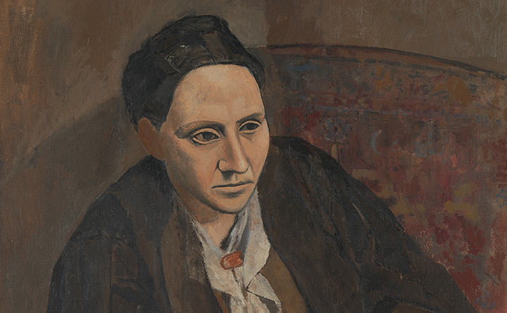 Detail of portrait painting of a woman, Gertrude Stein, wearing brown seated in a brown chair. 