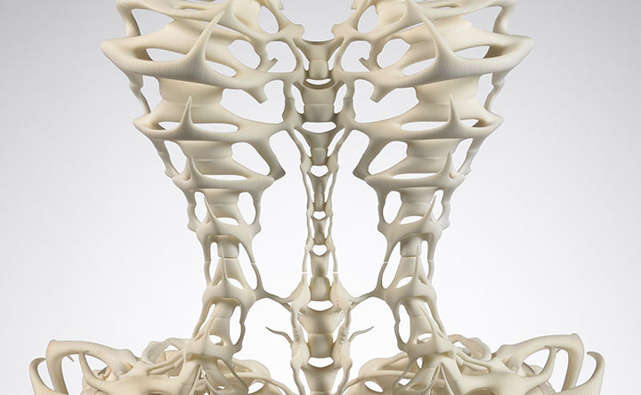 Detail of a dress that is made from fake human bones. 