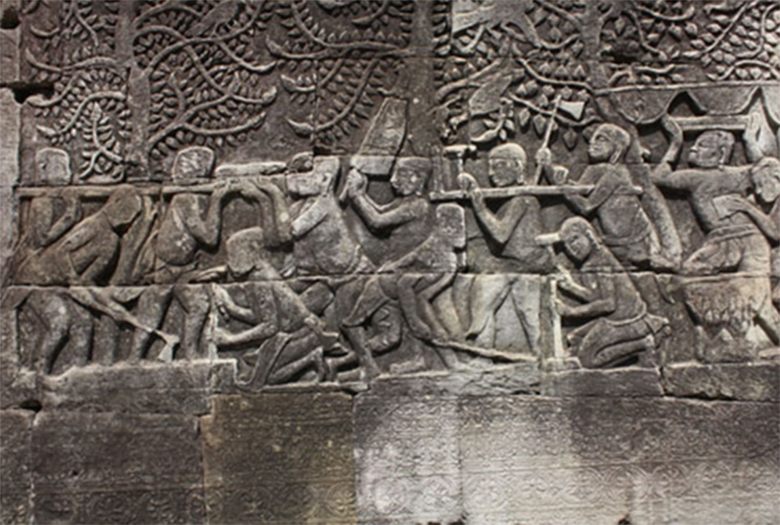 This bas-relief from the south gallery of Bayon temple (ca. twelfth century) might depict Khmers working in a stone quarry (Higham, 2002). Scenes describing the transportation and levering of stone blocks are also carved in other galleries of the same temple.