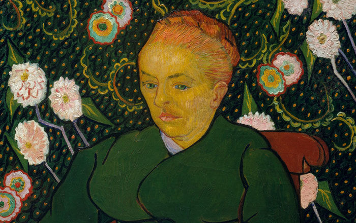 Painting of a woman seated in front of floral wall paper