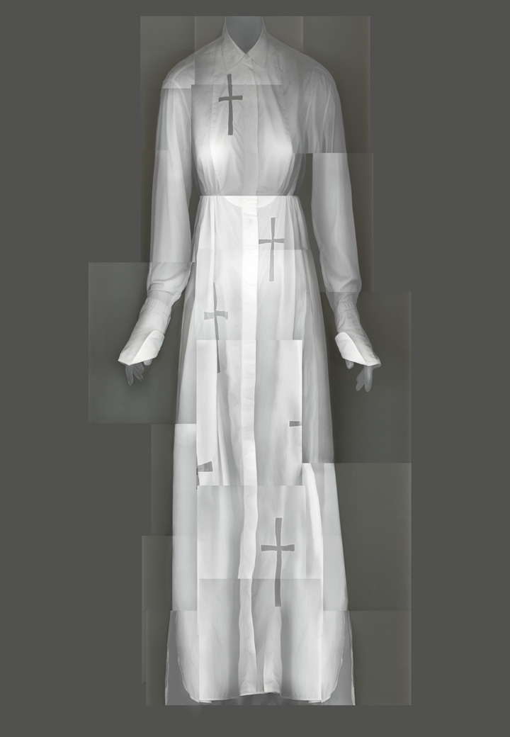 Azzedine Alaïa dress made of white silk and adorned with Catholic cross designs