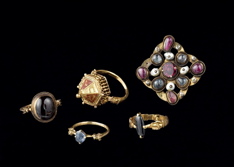 Five rings made from gold, silver and assorted precious stones from the Colmar Treasure