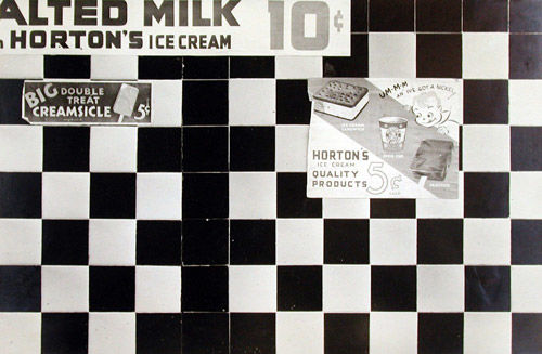 [Checkerboard Tiled Wall Detail with Ice Cream Advertisements, New York City]