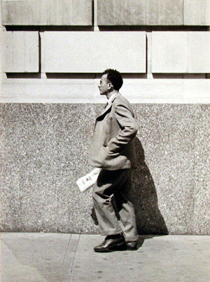 [Man in Suit Holding Newspaper on Street, New York City]