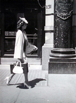 [Woman Walking Past Saks and Company Department Store, New York City]