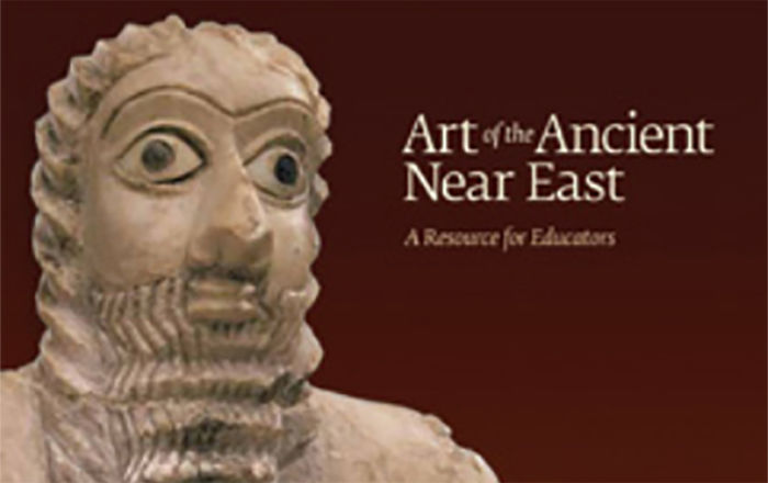 Cover of a brochure with a stone sculpture of a man with a long curly beard and hair, clasping his hand across his chest