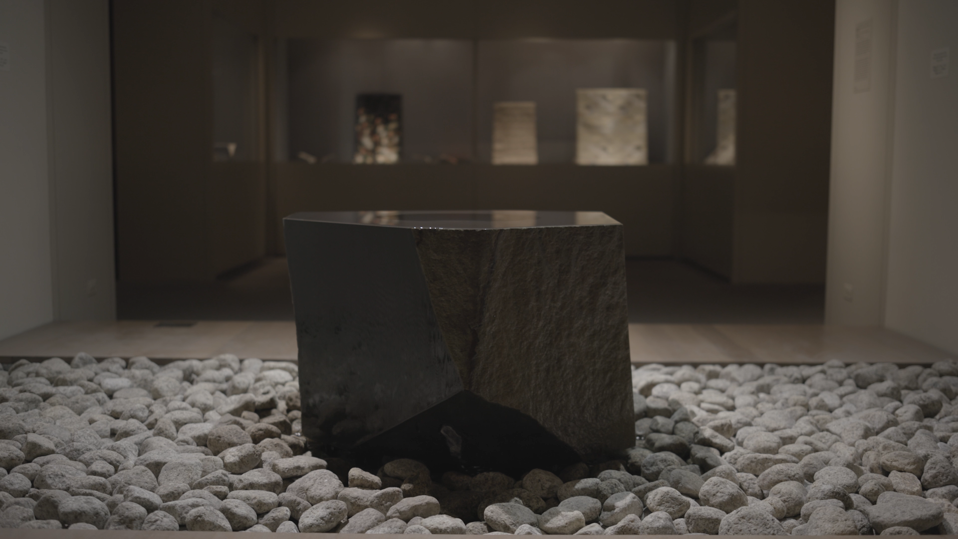 Isamu Noguchi's Water Stone fountain sculpture, located in gallery 229 at The Met Fifth Avenue