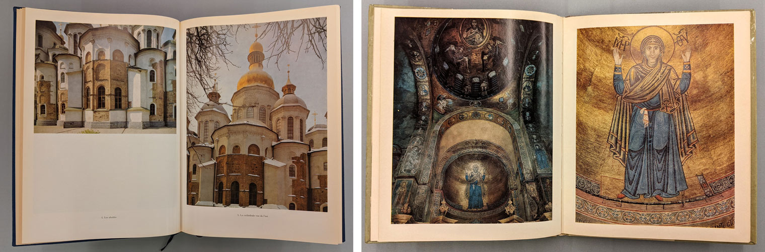 Open book showing color photographs of Saint Sophia Cathedral next to another open book showing interior of the church