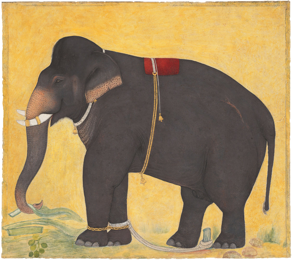 Painting of an elephant eating leaves against yellow background