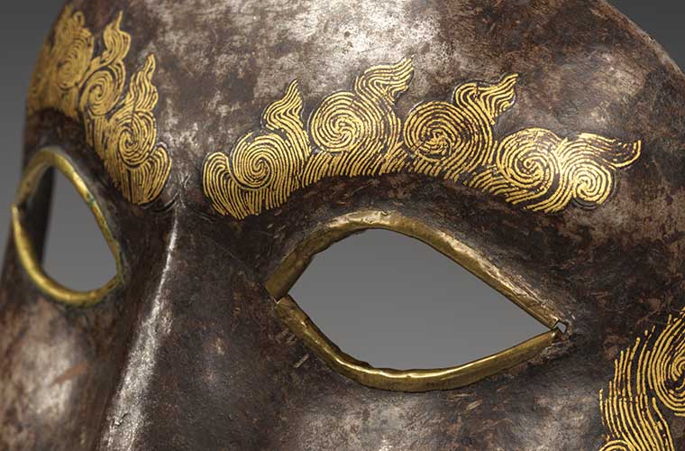 Close up of a Tibetan war mask featured in an episode of MetCollects