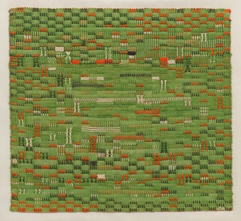 A woven tapestry composed of small blocks of color